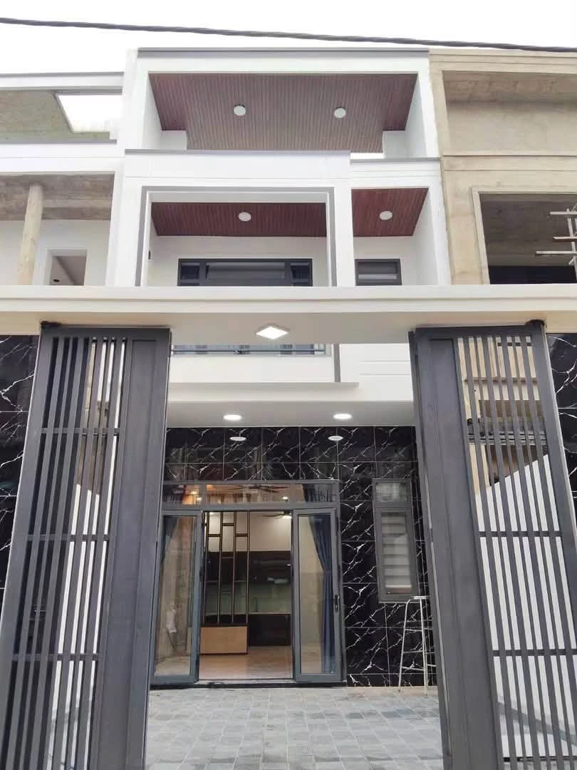 Bán nhà phố 100m2, 3PN, sổ hồng riêng, đường ĐX 07 Tân Vĩnh Hiệp - Ảnh thu nhỏ 2