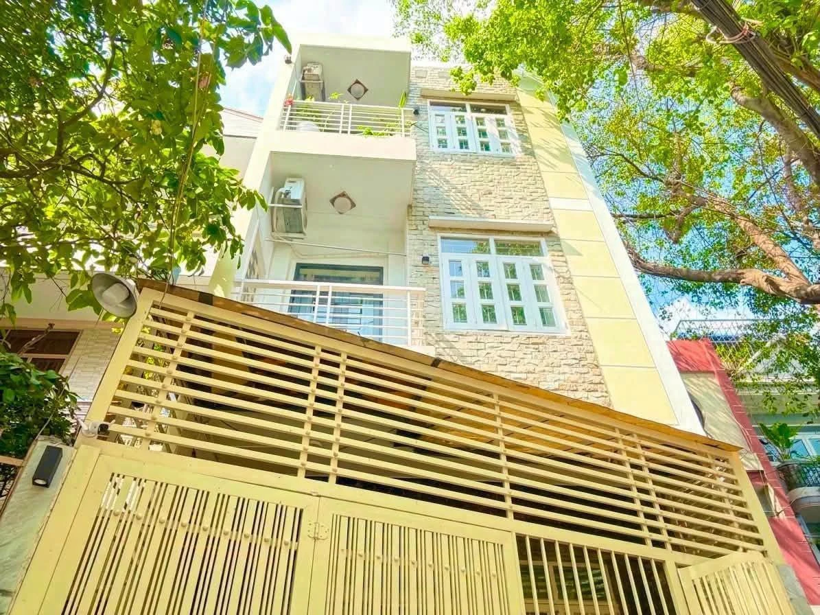 Bán nhà 4 tầng 13 phòng 2 mặt tiền hẻm xe hơi Lê Quang Định, Bình Thạnh giá 15,9 tỷ - Ảnh 1