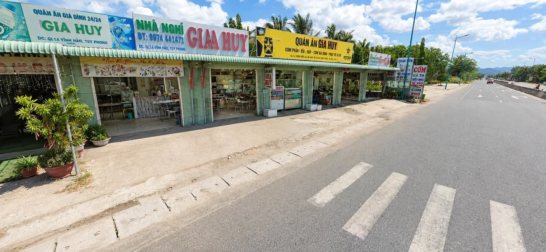Bán nhà nghỉ + quán cơm mặt tiền QL1A Vĩnh Hảo 3.060m² - Ảnh 1