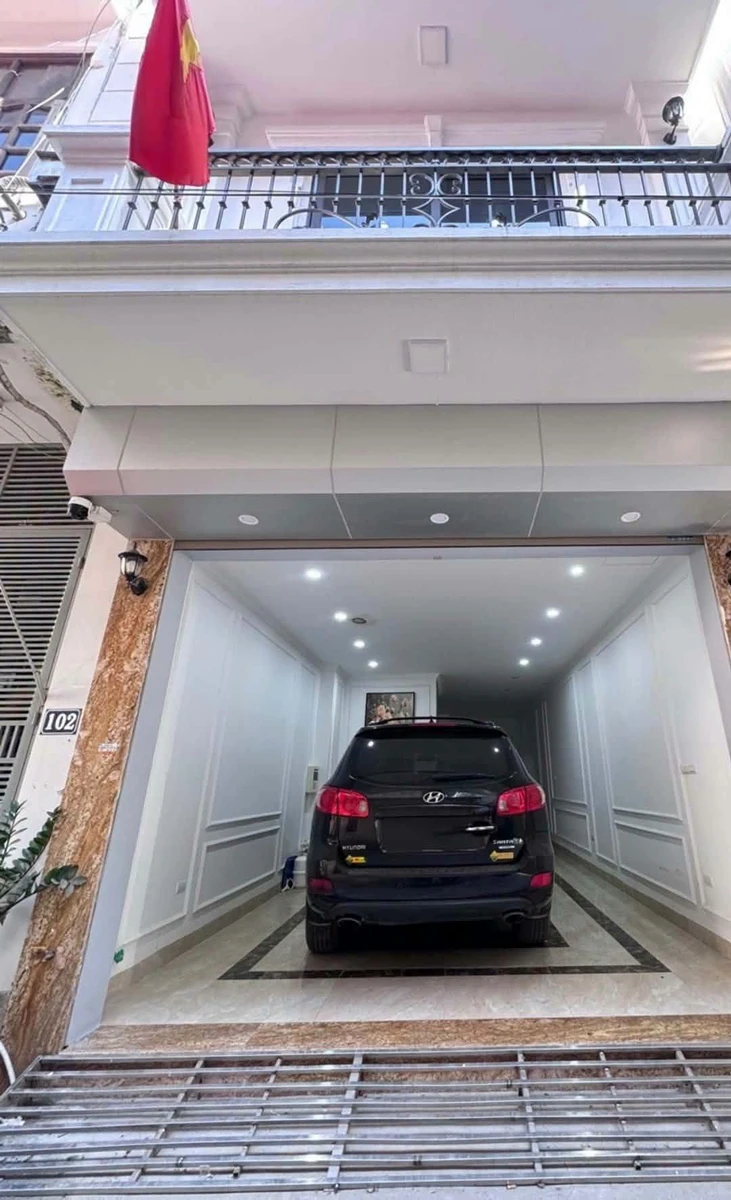 Bán nhà 5 tầng 50m² có gara ô tô, thang máy, 4 phòng ngủ tại Lê Trọng Tấn, Hà Nội - Ảnh 1