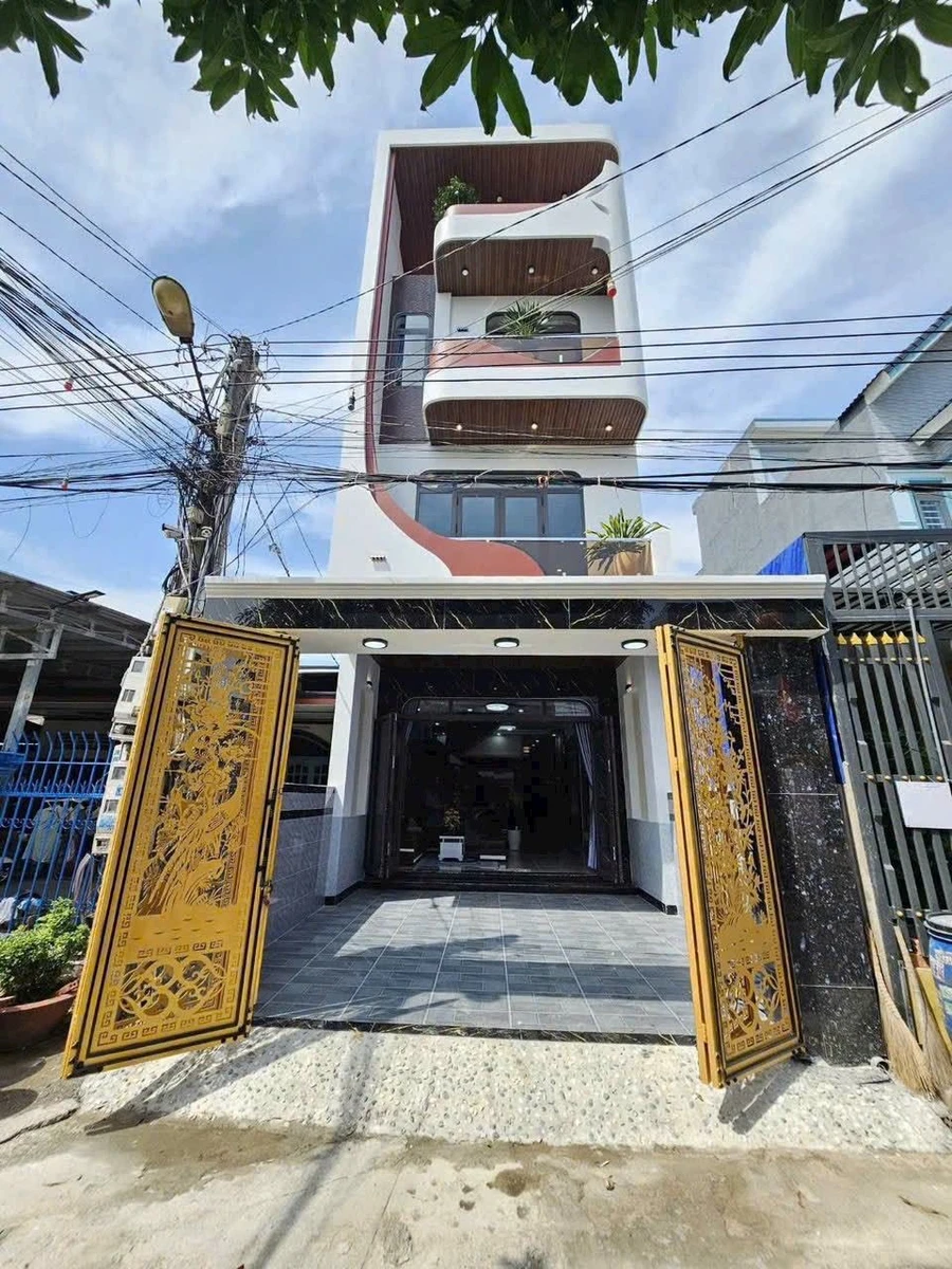 Bán nhà 100m2 trệt 2 lầu, đầy đủ nội thất gần Chợ Dĩ An 1 - Ảnh 1