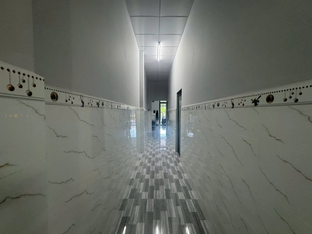 Bán nhà mặt tiền đường Nguyễn Thị Thập, KDC Vĩnh Thông, An Giang, 125m2 - Ảnh 1