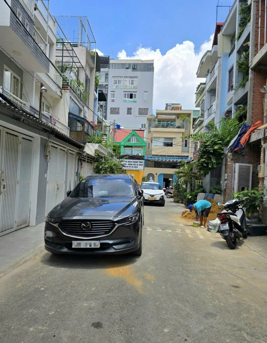 Bán nhà hẻm 8m 4 tầng 80m² gần Nhà ga T3 Hoàng Hoa Thám, Tân Bình - Ảnh 1