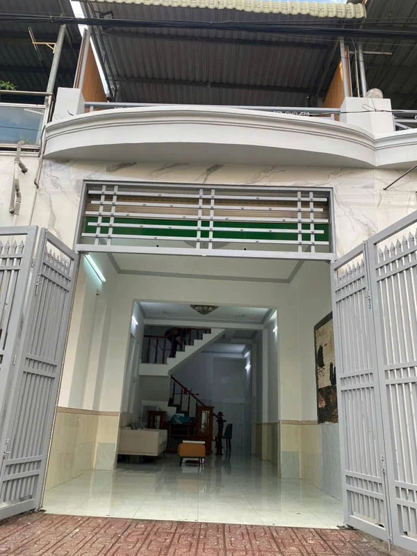 Bán nhà 1 trệt 1 lầu 60m2, 2PN, sân ô tô, gần ngã tư Vincom 550, Dĩ An, Bình Dương