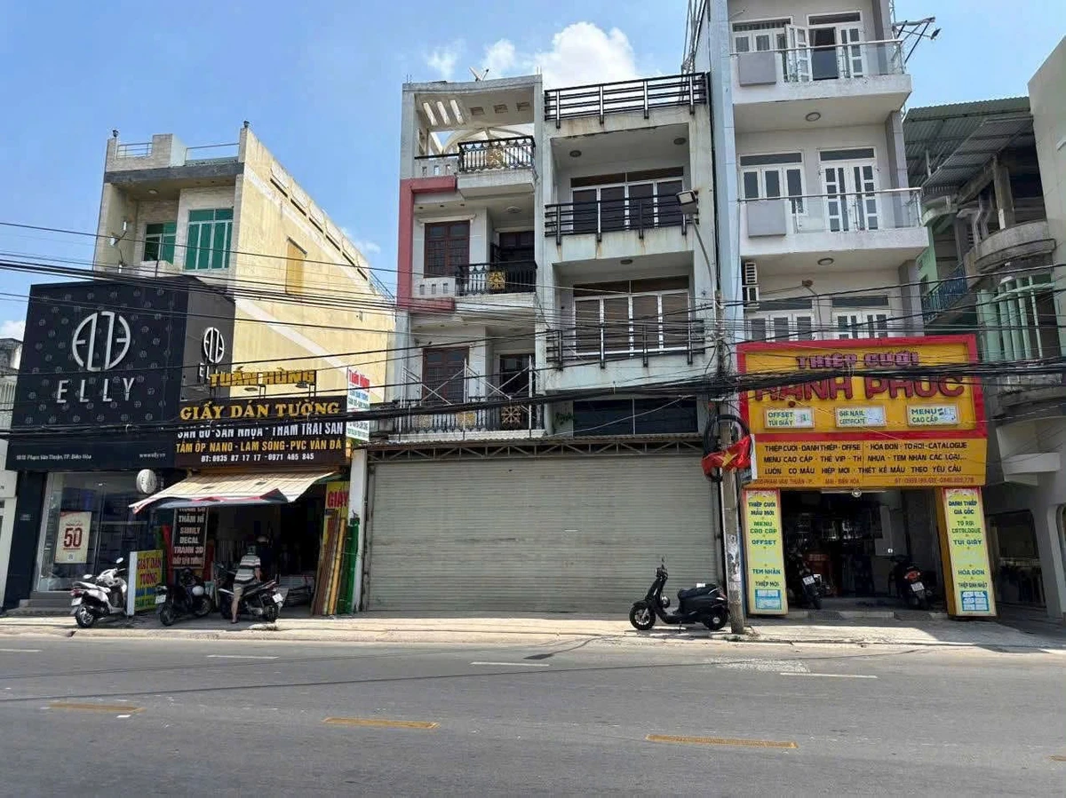 Bán nhà 1 trệt 3 lầu 2 mặt tiền đường Phạm Văn Thuận, Tam Hiệp, Đồng Nai, 218m2, 35 tỷ - Ảnh 1