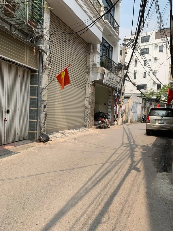 Bán nhà 8 tầng 89m2 phố Trạm, thang máy, gara 4 ô tô, giá 28 tỷ