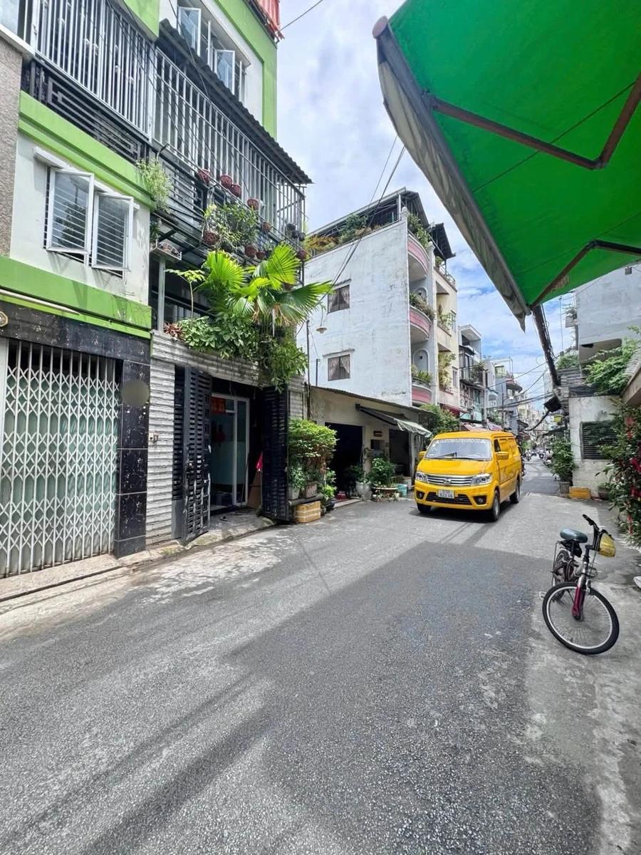 Bán 2 căn nhà 4 tầng liền kề hẻm xe tải 373 Lý Thường Kiệt, diện tích gần 100m2 - Ảnh 1