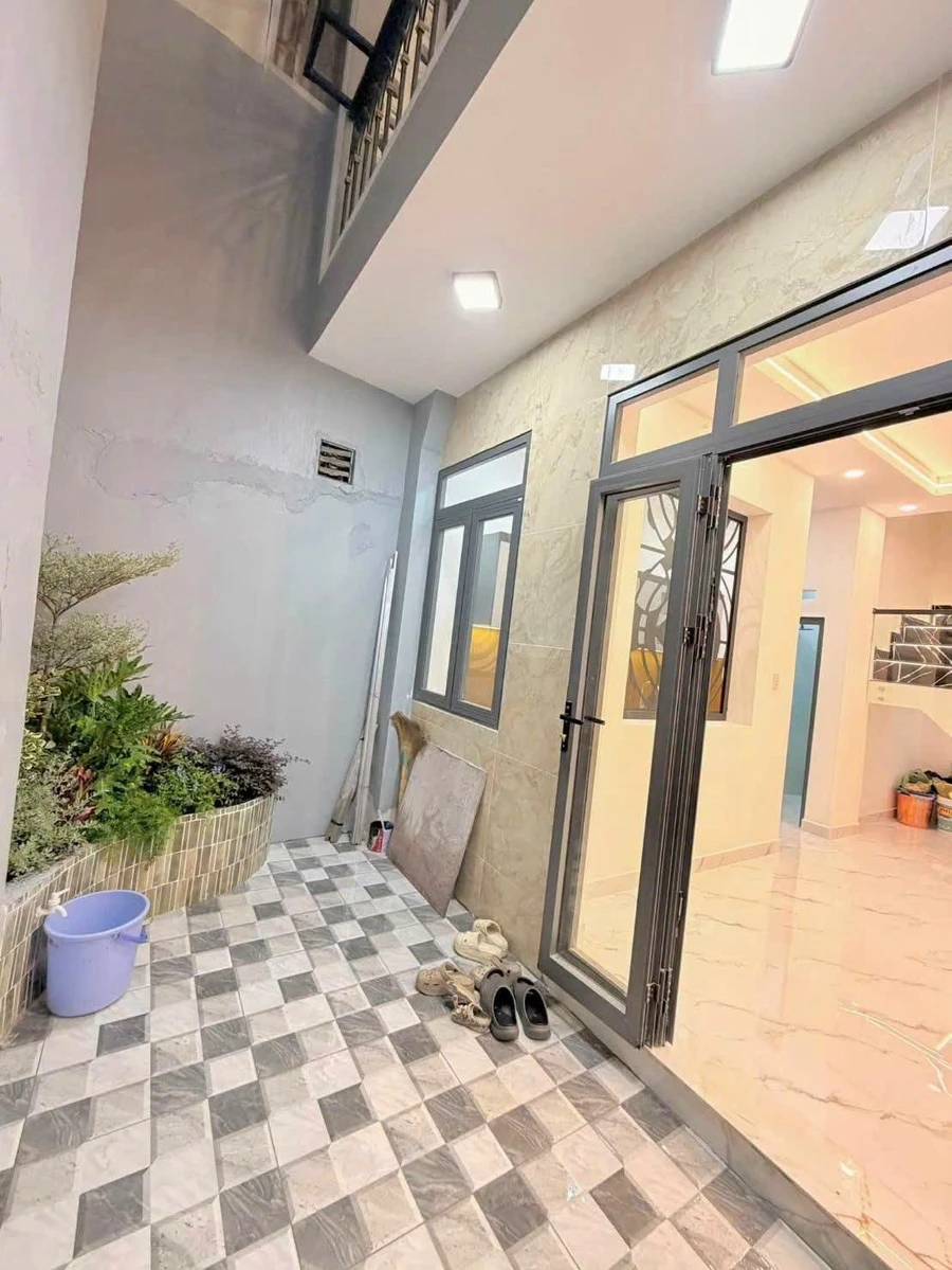 Bán nhà mới 1 trệt 1 lầu 52m2 3PN Quận 4, giá 4,89 tỷ - Ảnh 1