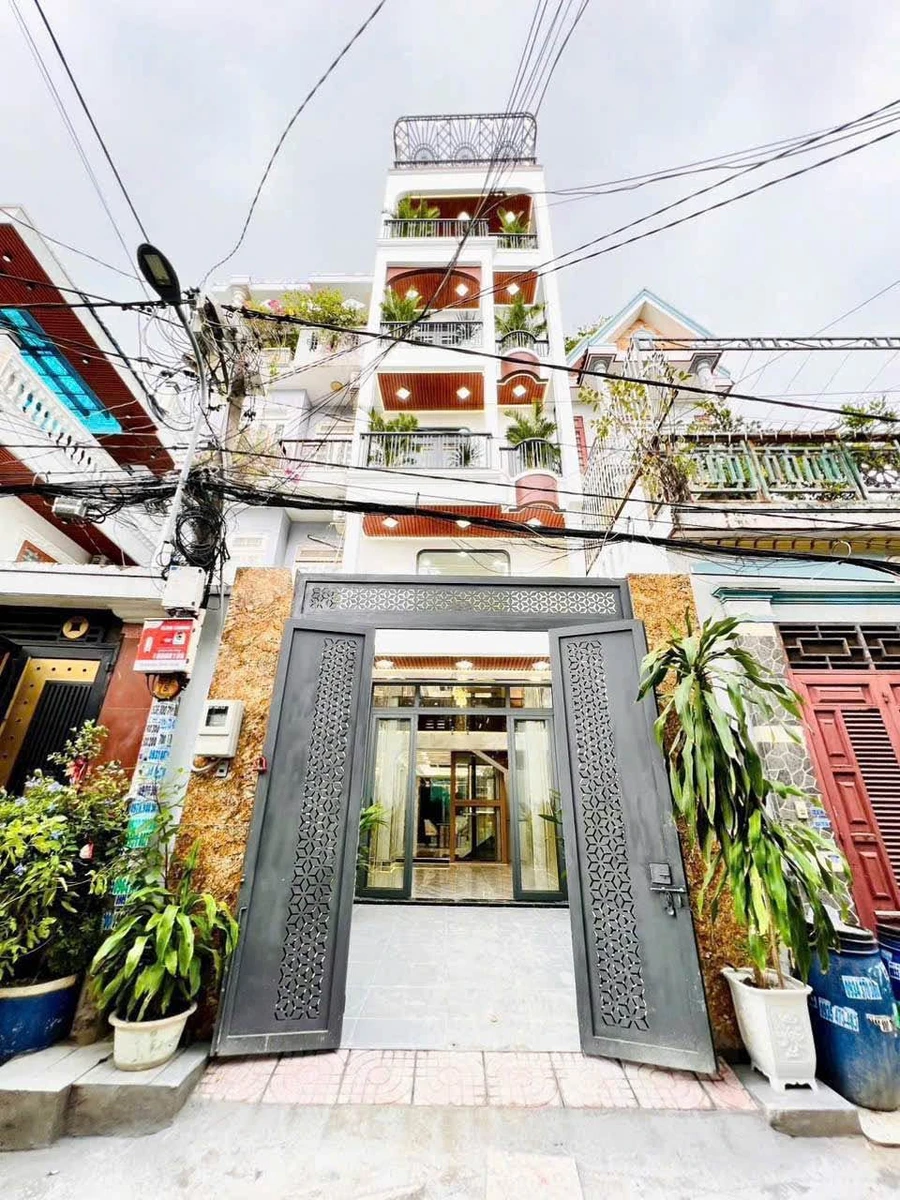 Nhà phố 5 tầng thang máy mặt tiền hẻm, 84m², Quận 12 - Ảnh 1