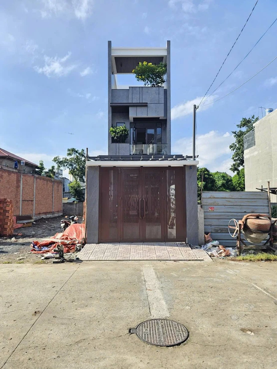 Bán nhà 1 trệt 1 lầu MT Thông Buôn Bán Dĩ An 100m² - 6,9 tỷ - Ảnh 1