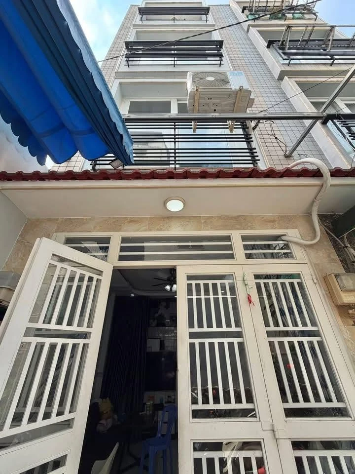Bán nhà phố 4 tầng 5 phòng ngủ sân riêng Cây Quéo Bình Thạnh 6.95 tỷ - Ảnh 1
