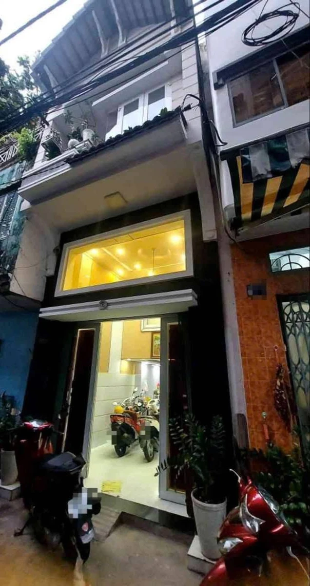 Bán nhà 1 trệt 1 lửng 1 lầu 3,5x7,5m đường Lạc Long Quân, Quận 11, giá 4,65 tỷ - Ảnh 1