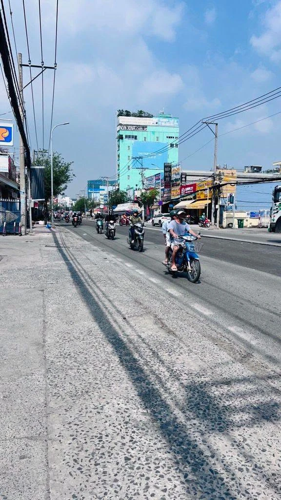 Bán nhà dịch vụ 101m² 12 phòng MT Huỳnh Tấn Phát, Quận 7 - Ảnh 1