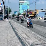 Bán nhà dịch vụ 101m² 12 phòng MT Huỳnh Tấn Phát, Quận 7 - Ảnh thu nhỏ 1