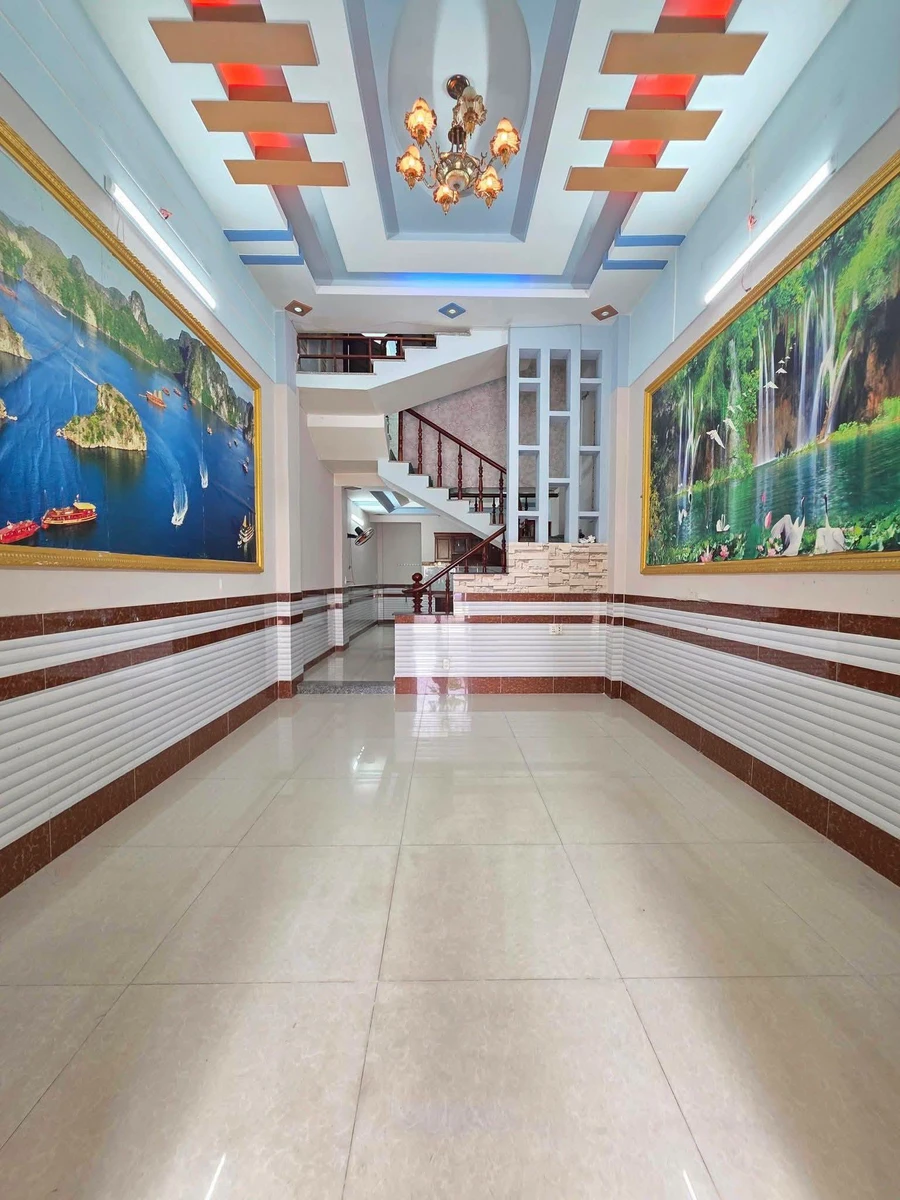 Bán nhà trệt lửng lầu 60m² gần Champaca Đông Hòa - Ảnh 1