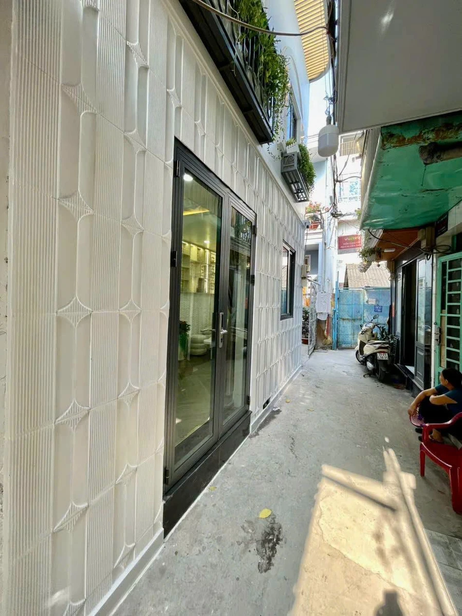 Bán nhà Quận 7, 33m², 2PN, 2WC, sổ riêng giá 3,999 tỷ - Ảnh thu nhỏ 2