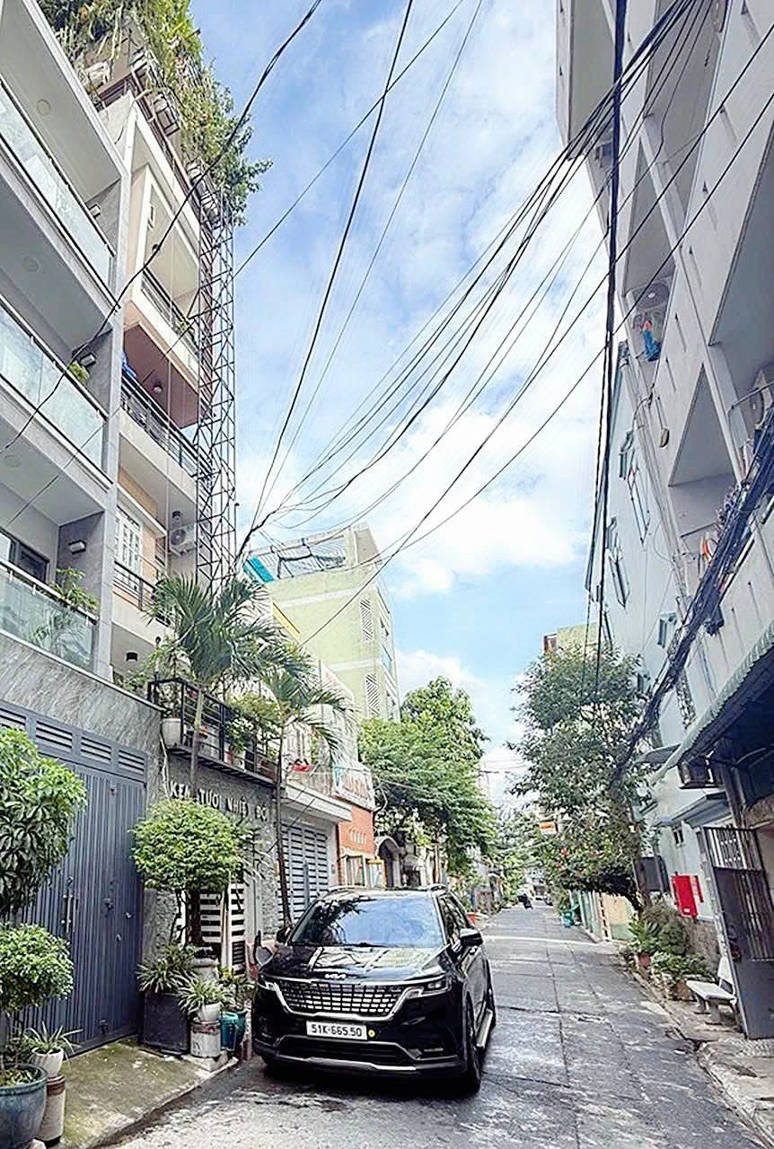 Bán nhà mặt tiền hẻm 8m đường Văn Chung, 80m², 4PN, gần ga T3, Tân Bình - Ảnh 1