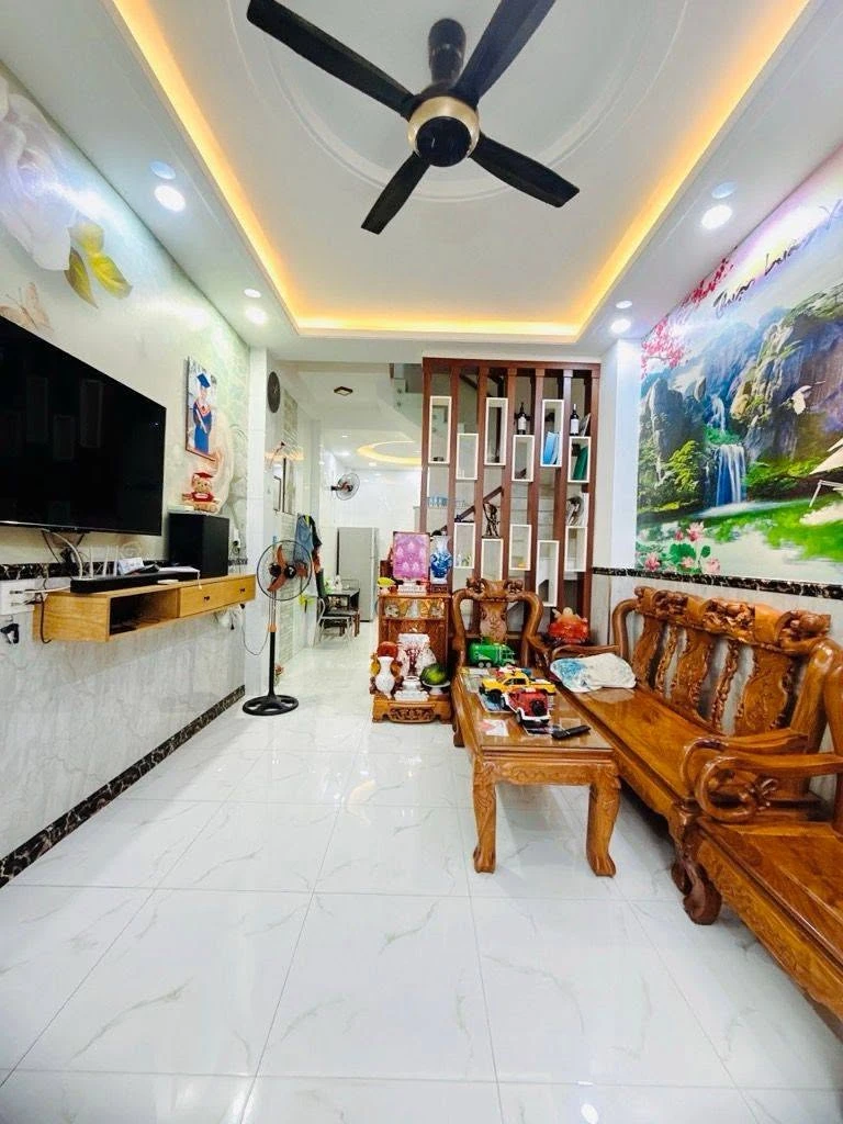 Nhà bán 4 tầng hẻm xe hơi 40m² Lê Quang Định hơn 7 tỷ - Ảnh 1
