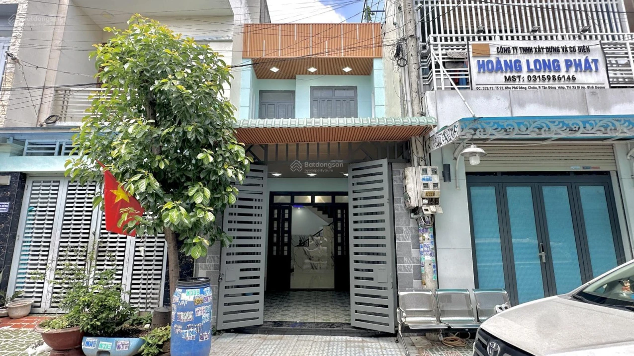 Bán nhà Tân Đông Hiệp gần ngã tư Chiêu Liêu, 60,6m2, sổ hồng riêng, đường 11m, giá 3,95 tỷ - Ảnh 1