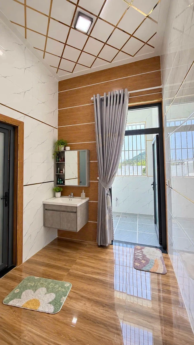 Nhà 1 trệt 1 lầu mặt tiền 125m² Long Hải 3,85 tỷ - Ảnh thu nhỏ 4