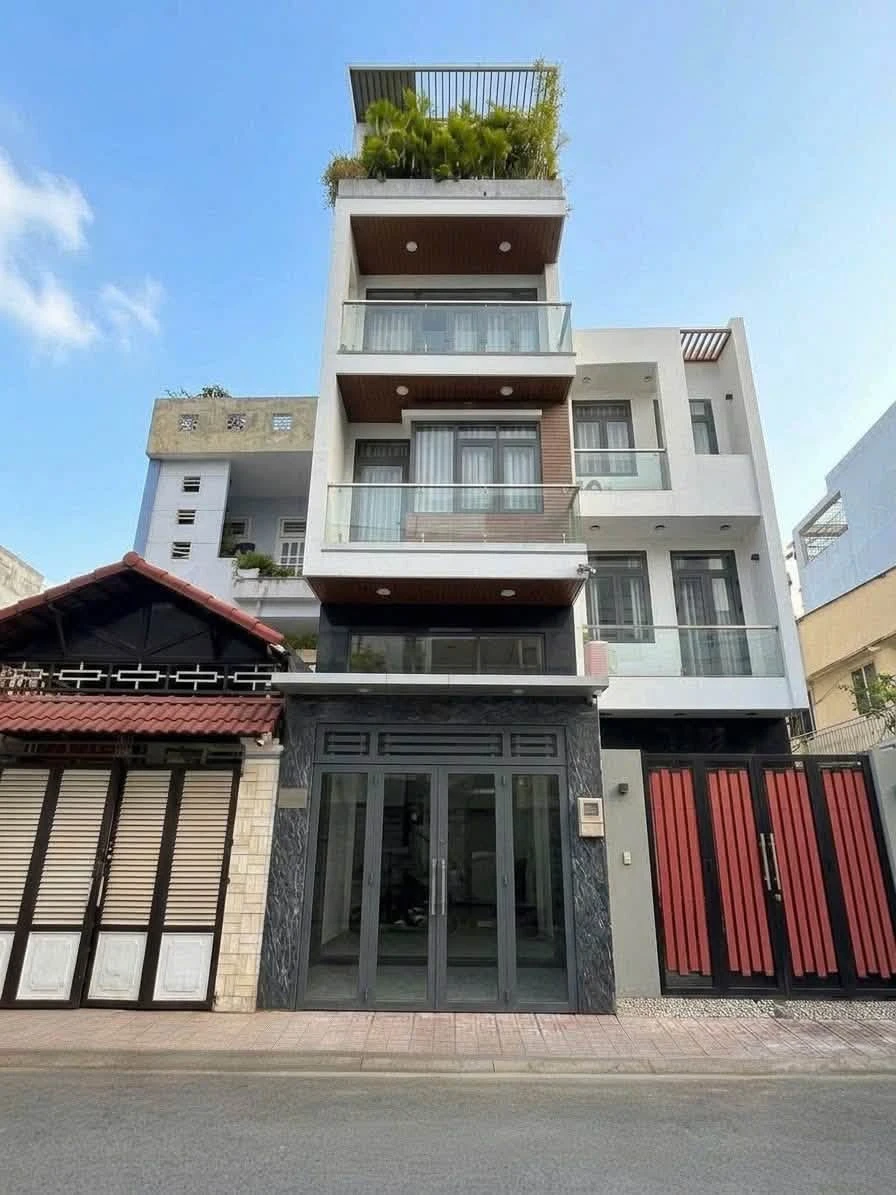 Bán nhà Tân Phú 70m², 5PN, 6WC, 10.99 tỷ, mặt tiền Tân Hương - Ảnh 1
