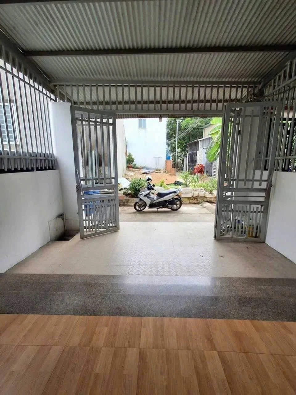 Bán nhà trệt lầu Long Bình Chợ Điều, 100m², 4PN - Ảnh 1