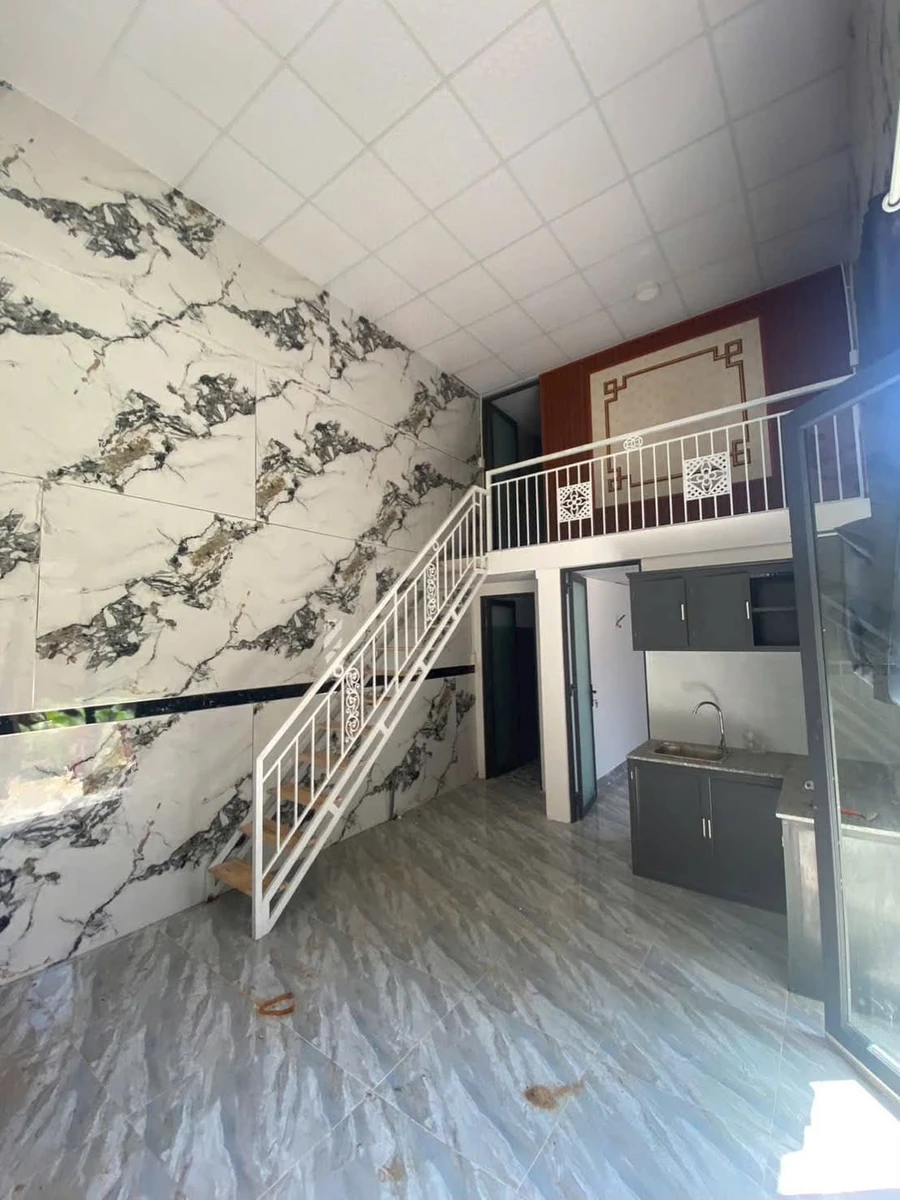 Bán nhà 2PN, 70m² gần chợ Trại Bò Long Bình, 560 triệu - Ảnh 1